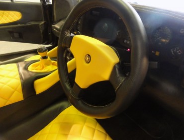 black and yellow steering wheel re-trim